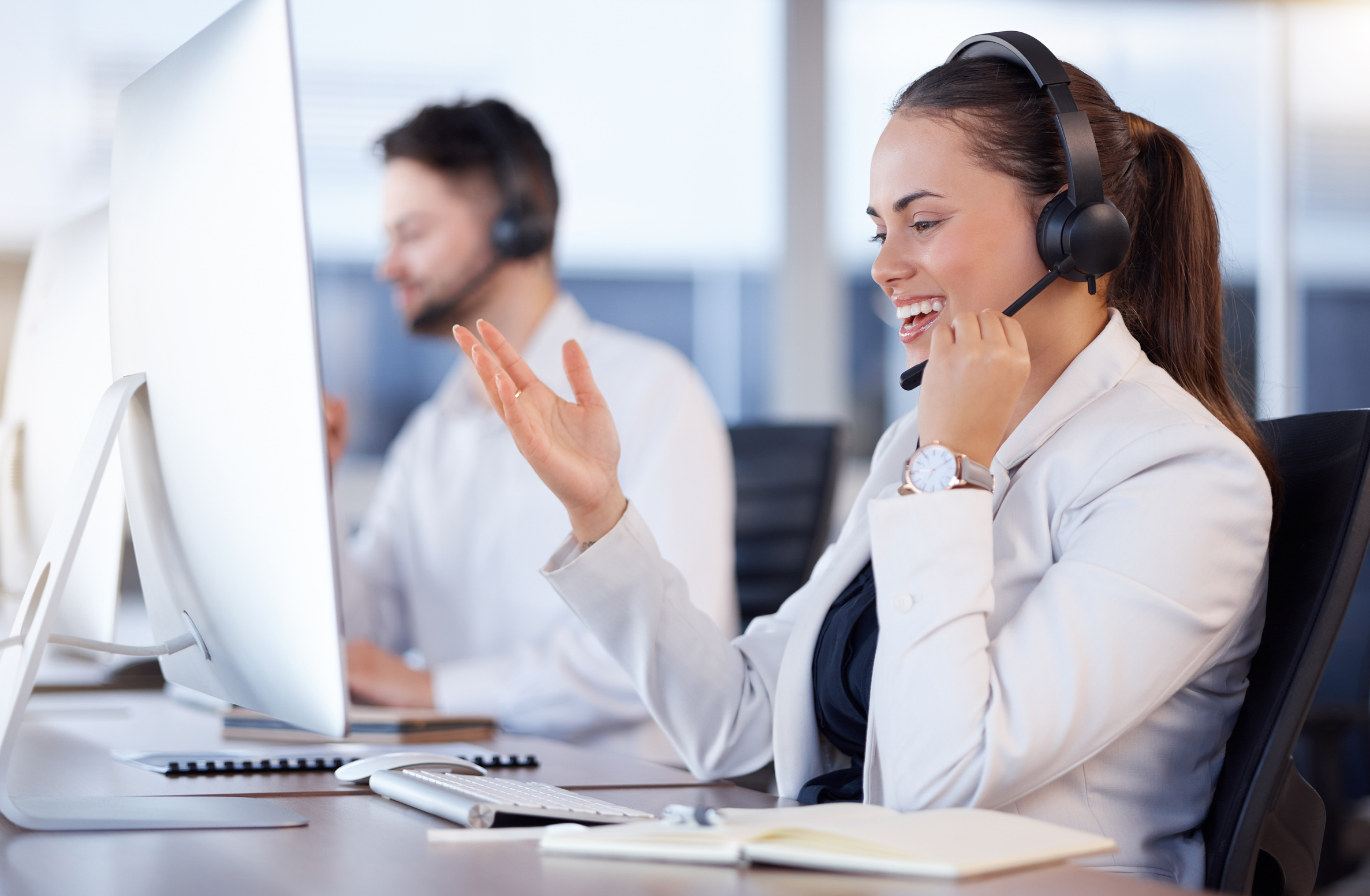 Contact us, call center or friendly woman speaking in telecom communications company in help desk. Happy smile, crm or insurance sales agent working or talking online in technical or customer support